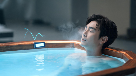 A composed person submerged to the shoulders in a sleek modern cold plunge, eyes closed mid slow-exhale with faint vapour drifting off the water