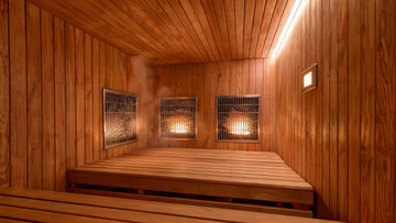 A wide shot of three sauna types arranged in a triptych composition — left: a warm cedar indoor infrared cabin with glowing panel heaters